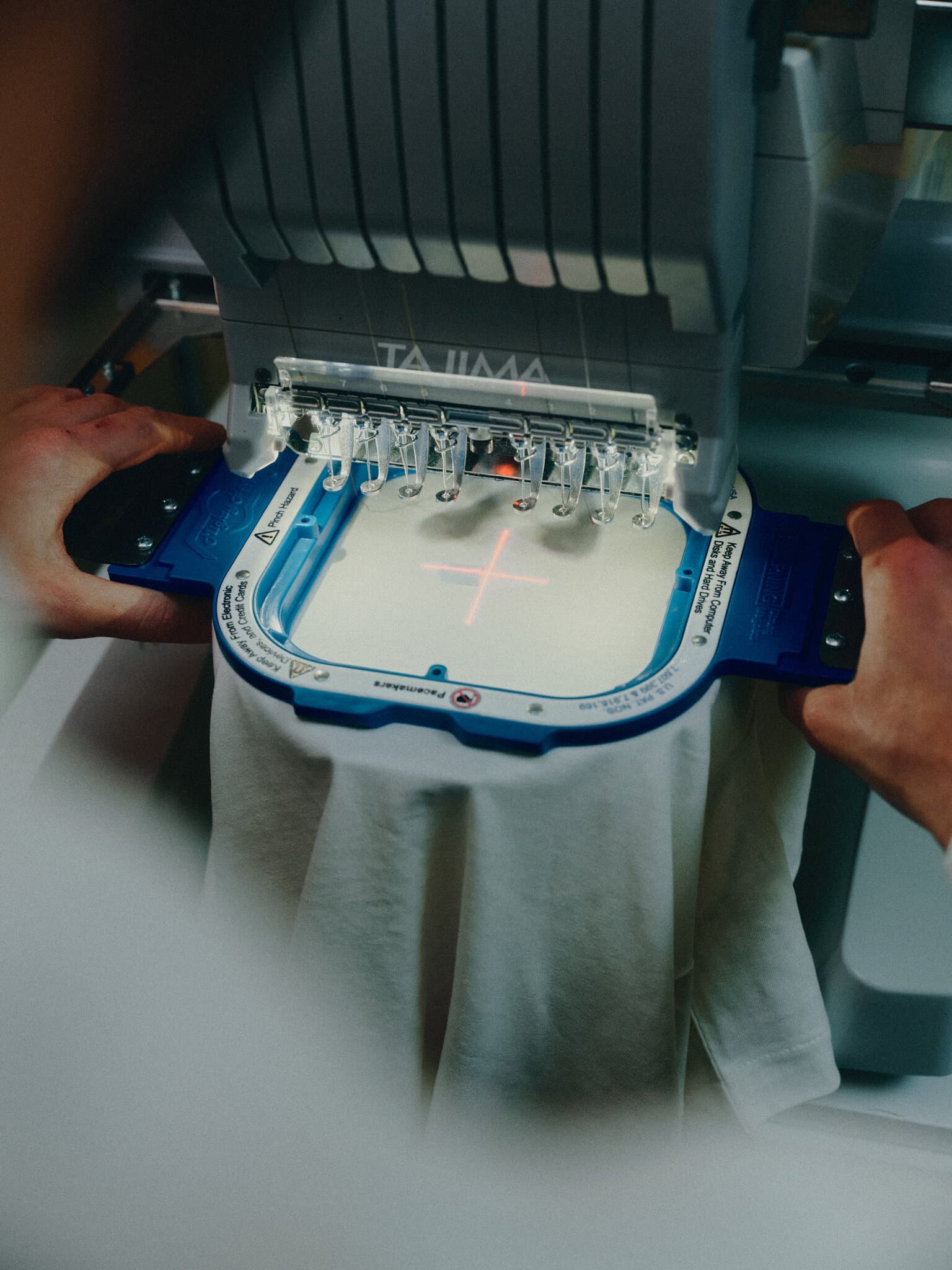 Hooped T-Shirt in Embroidery Machine